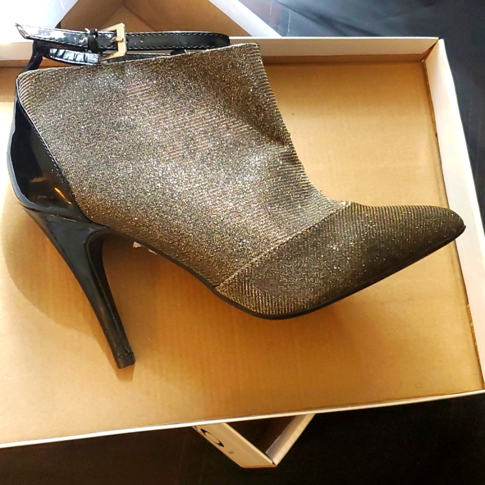 Shimmery high heel angle boots